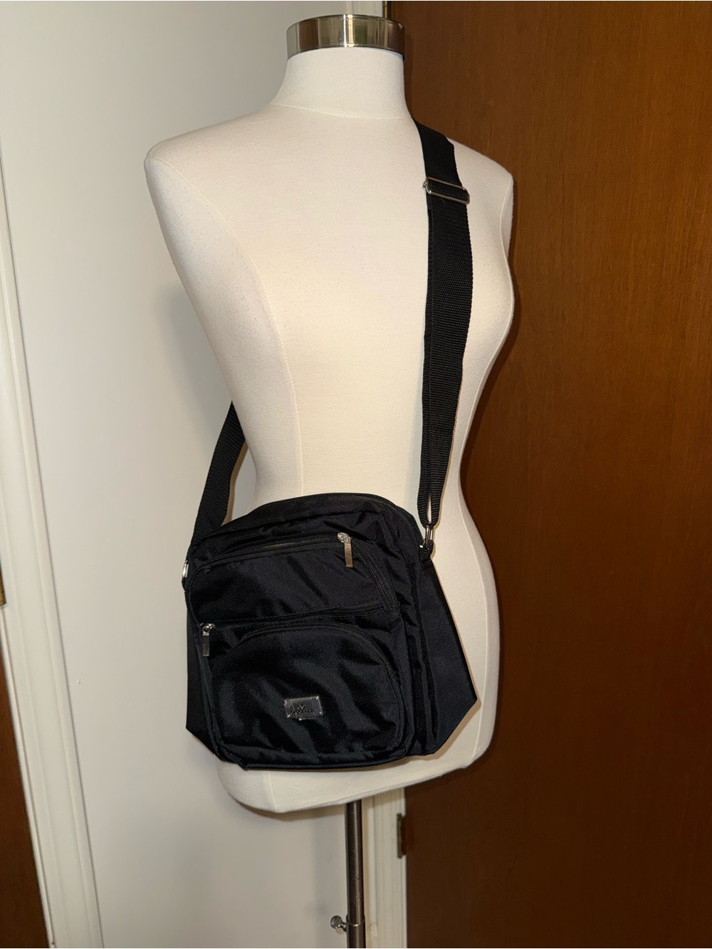 Sleek Black Crossbody Bag with Adjustable Strap NWOT